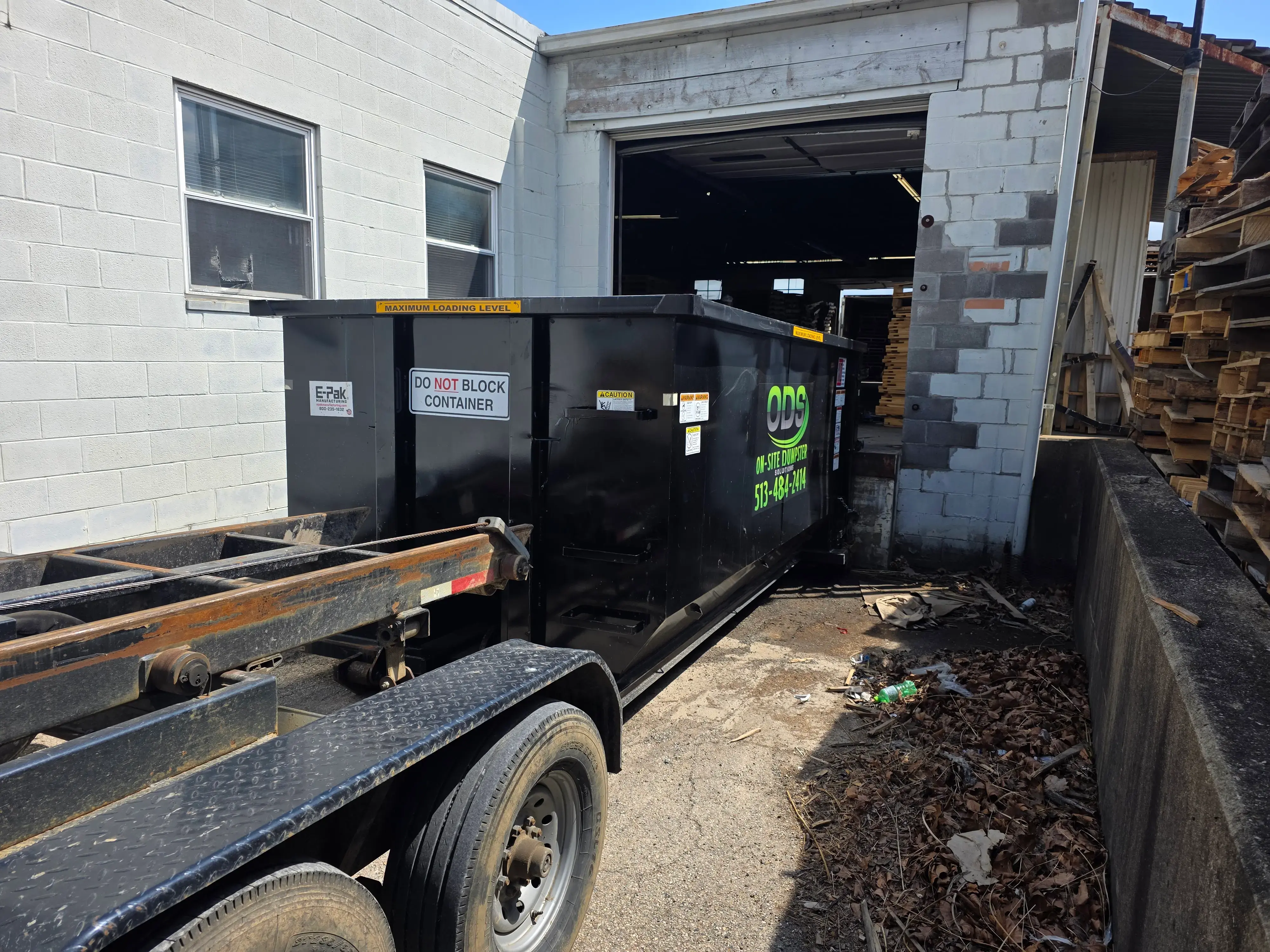 ODS roll-off dumpster placed in a narrow Colerain driveway